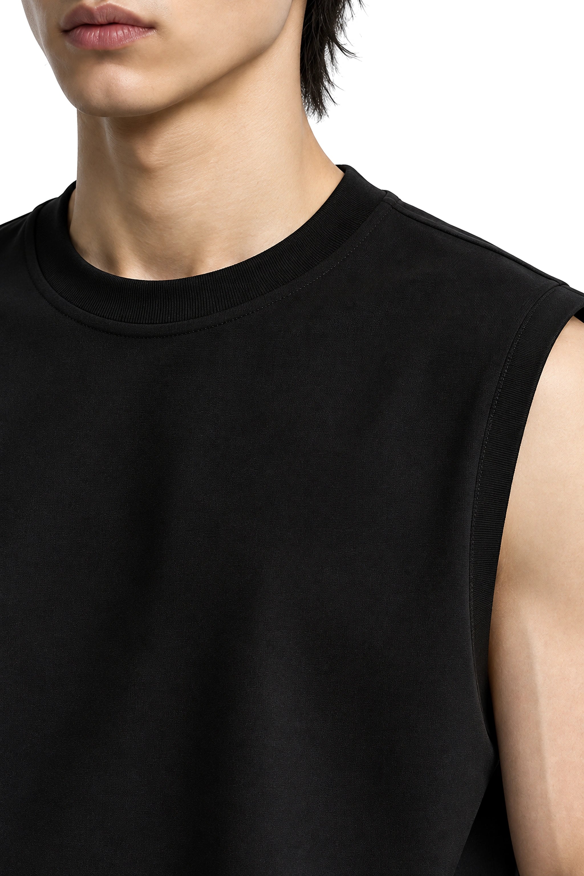 The Tank bonded armhole construction and ergonomic seam detail