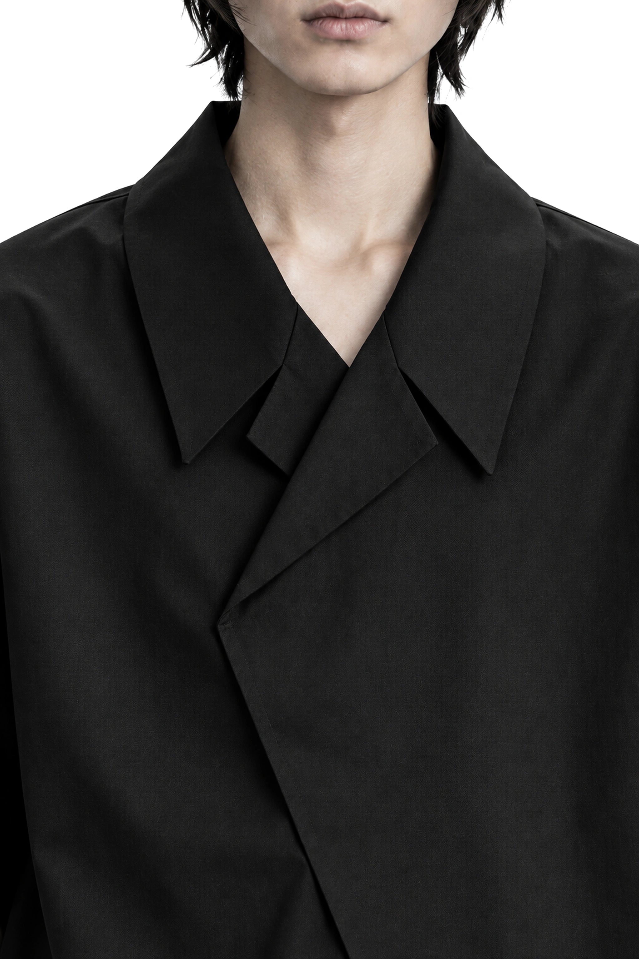 The Wrap Shirt collar structure and diagonal wrap overlap detail